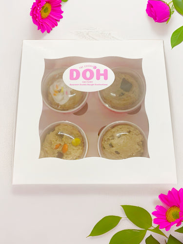 Edible cookie DOH flight sampler box with 2 Reese's Explosion and 2 birthday cake.